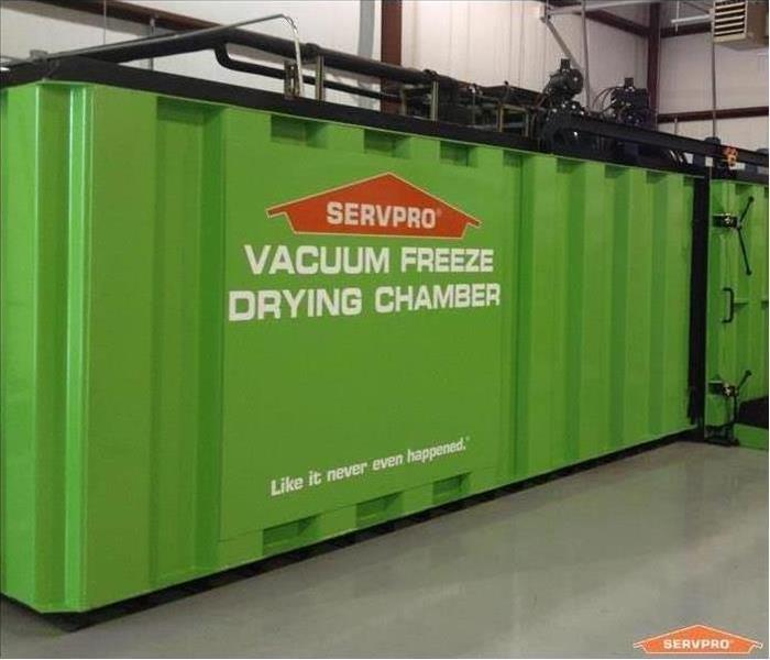 Green metal document drying chamber that looks like a freight box